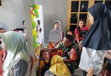 Wujud Babinsa Tawangrejo Dampingi Kegiatan Posyandu, Demi Tingkatkan Layanan Kesehatan Masyarakat